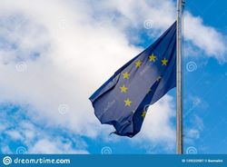 europiean-union-brexit-eu-blue-flag-yellow-stars-bl-blu-sky-sopy-space-close-up-129222587.jpg
