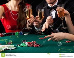 gamblers-drinking-champagne-couple-glass-37099567.jpg