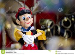 pinocchio-italian-wooden-puppet-souvenir-shop-39802355.jpg